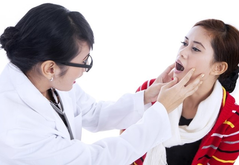 Doctor-checking-patient-for-salivary-gland-cancer