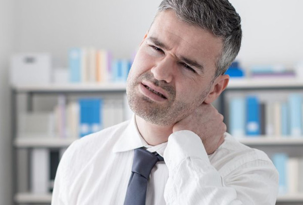 Man-dealing-with-discomfort-due-to-benign-neck-mass