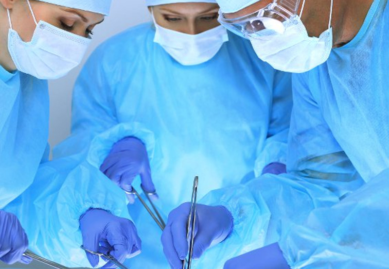 Surgeons-performing-laryngectomy